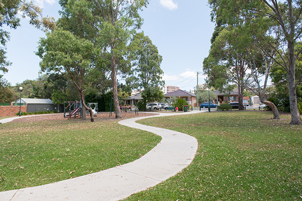 Local park with playground and footpath