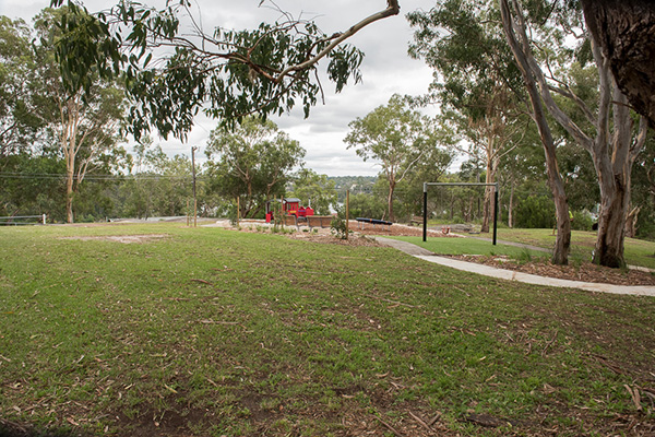 Open space grassed reserve with playground