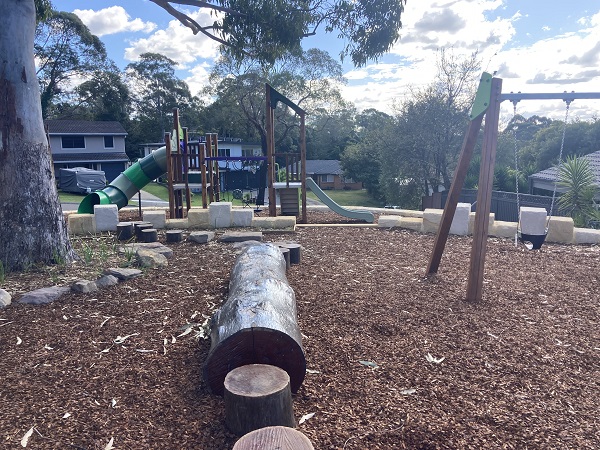 Stepping stones under large tree in playground