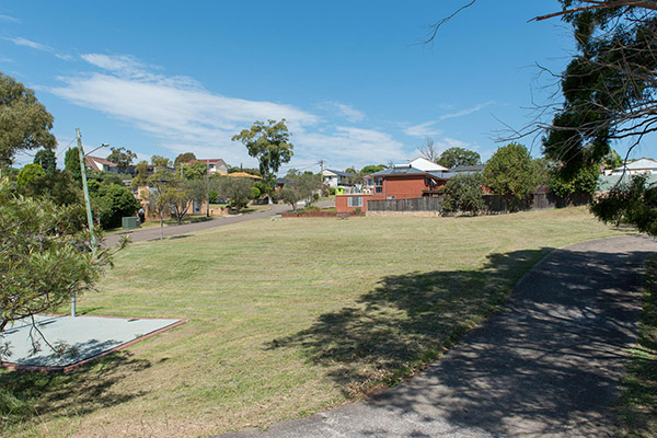 Grassy park with seat