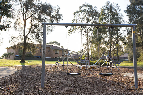 Playground with swings and climbing frame