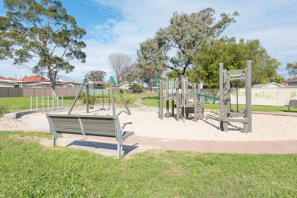 Playground with seats and sand softfall