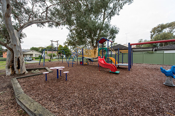 Local park with playground and trees
