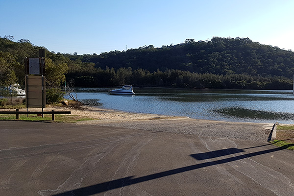 Boat ramp and boats in bay