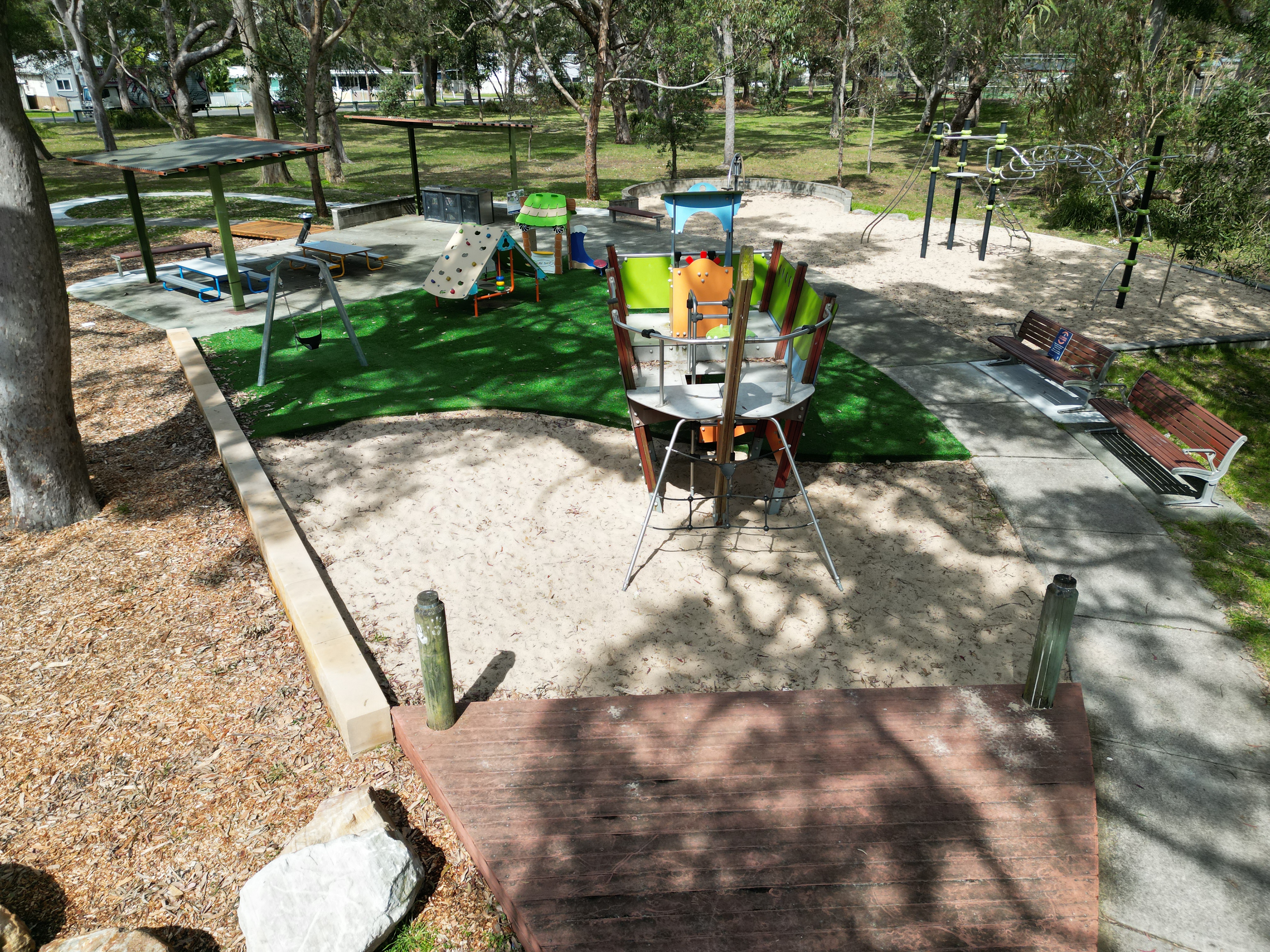 Playground with picnic facilities, climbing tower with slider
