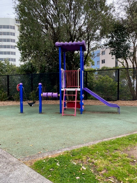 Playground with slide and swing