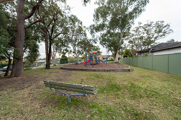 Local park with playground, seating and trees