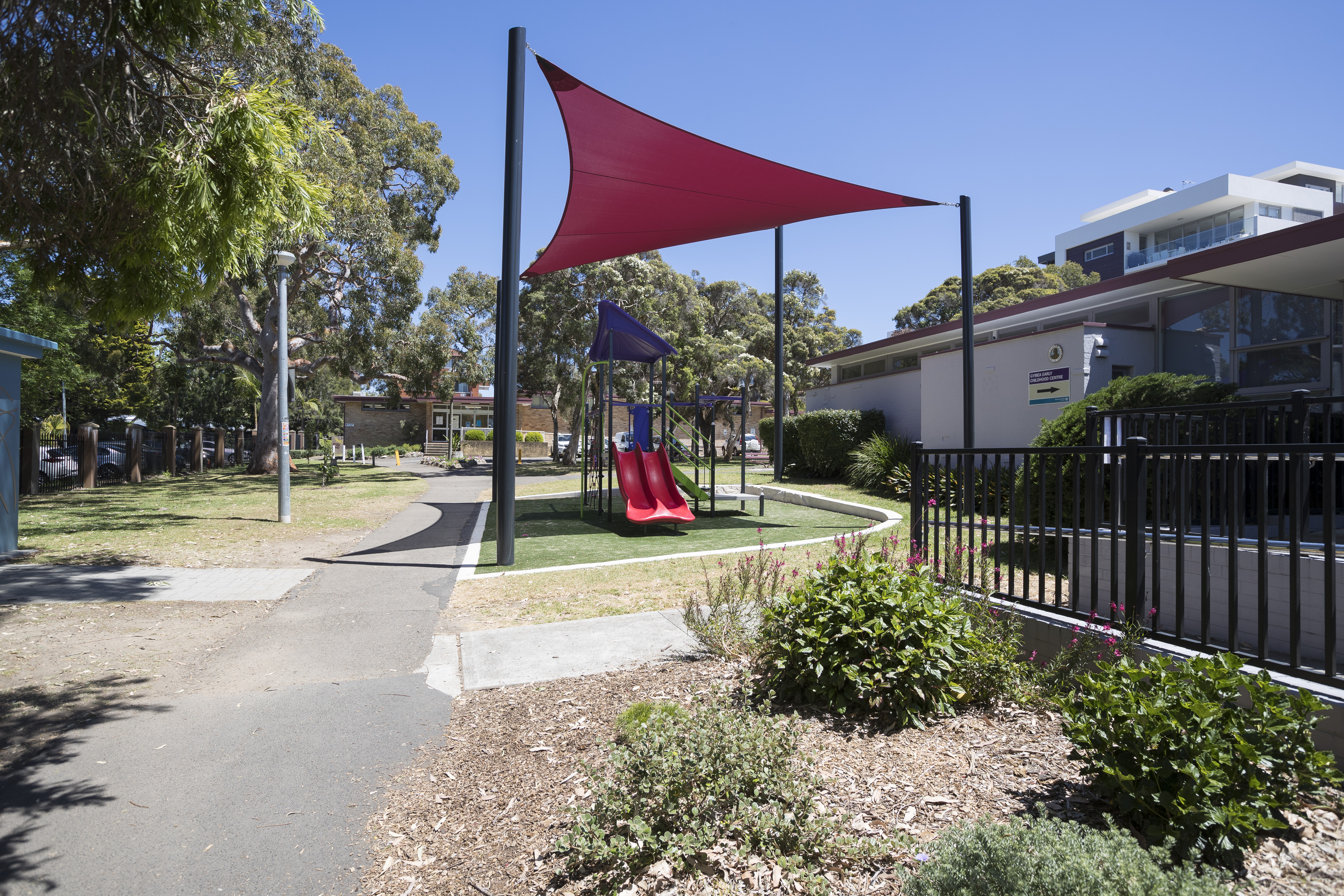 Playground with red shade sail