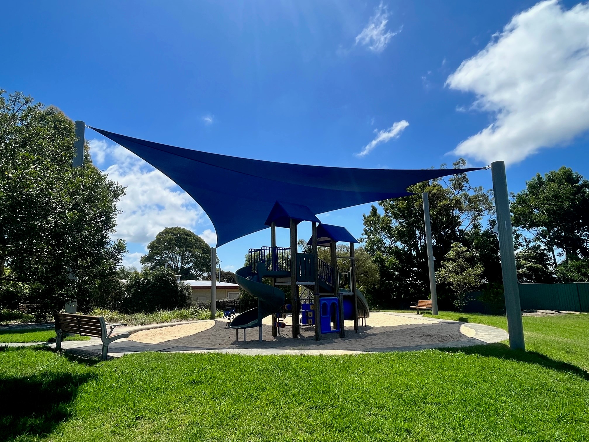 Playground with shade sail in reserve