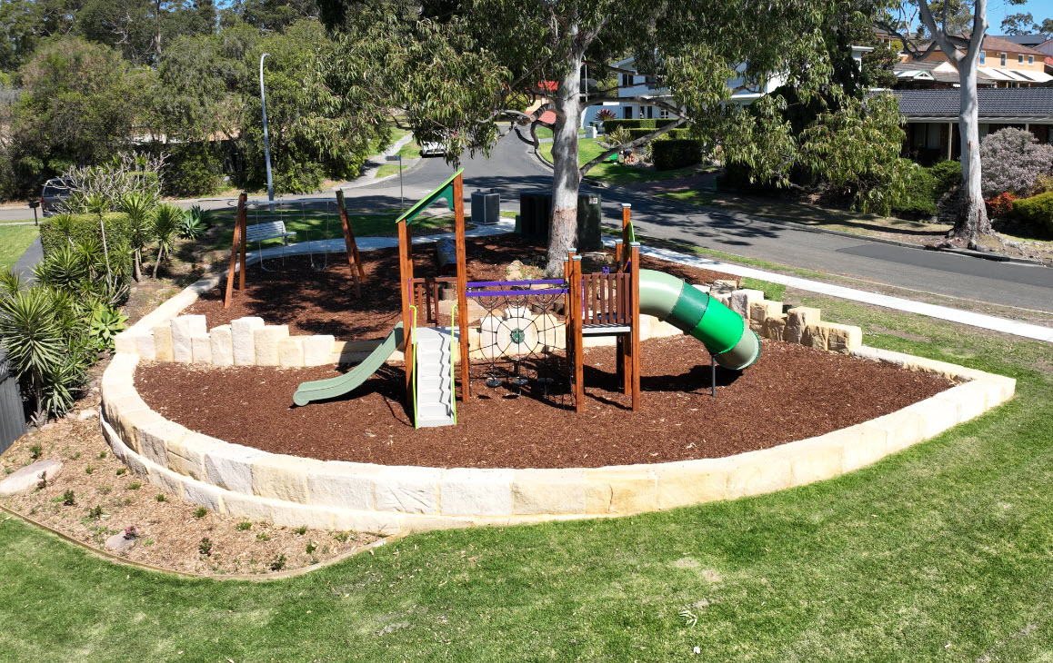 Aerial view of play equipment and gum tree