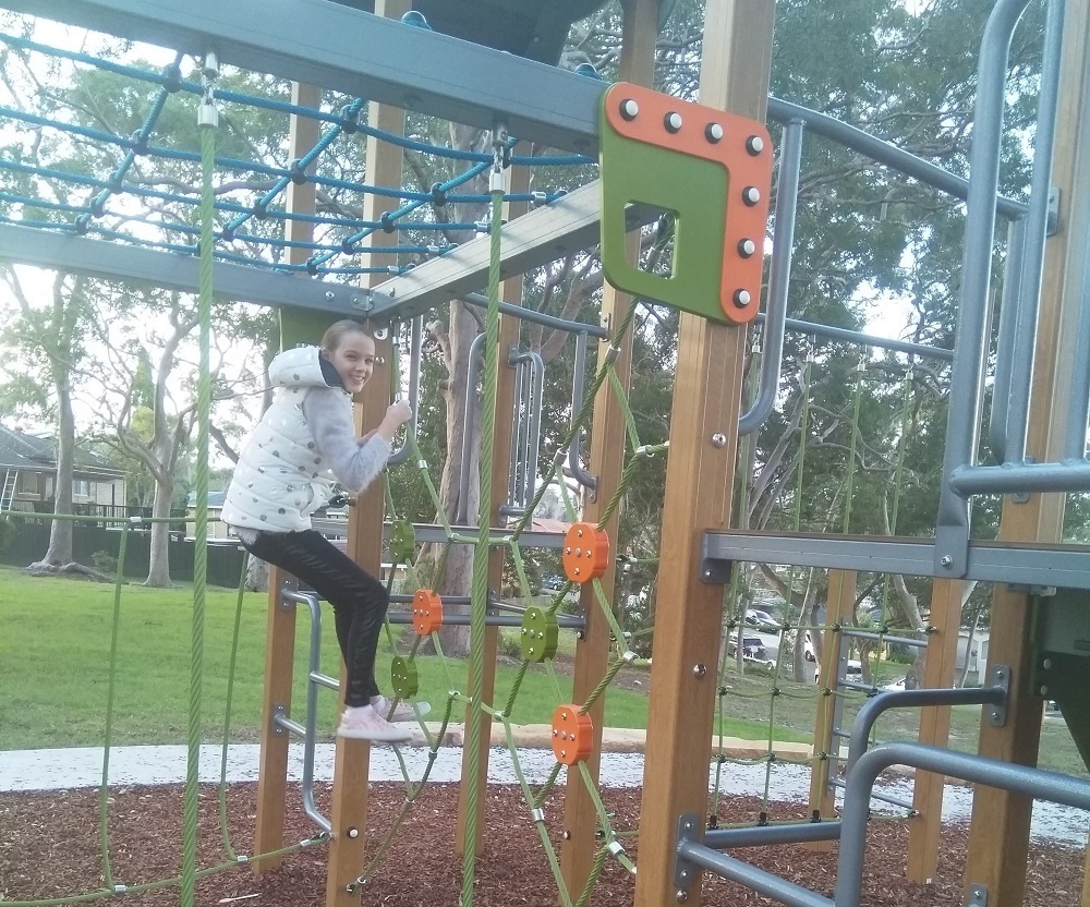 Girl climbing on playground