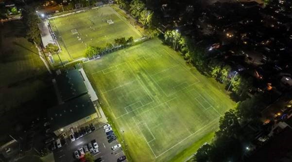 Aerial photo of playing fields at night