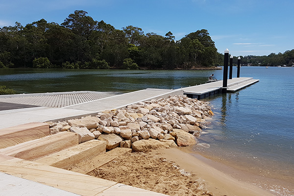 Pontoon and sandstone steps down to water