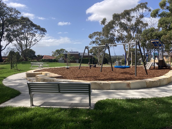 Leafy reserve with playground and trees