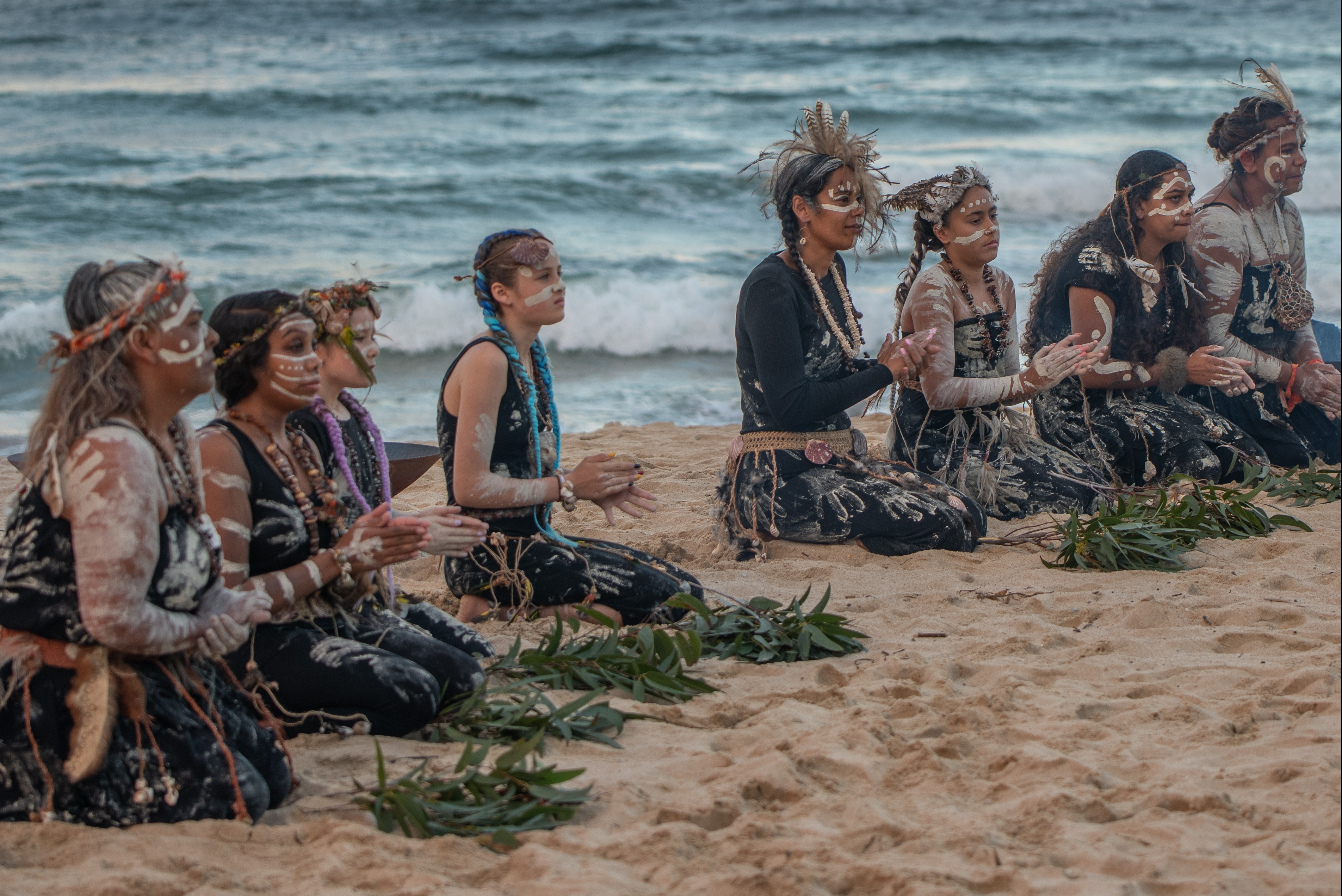 Aboriginal dancers on the sand at Cronulla Beach.