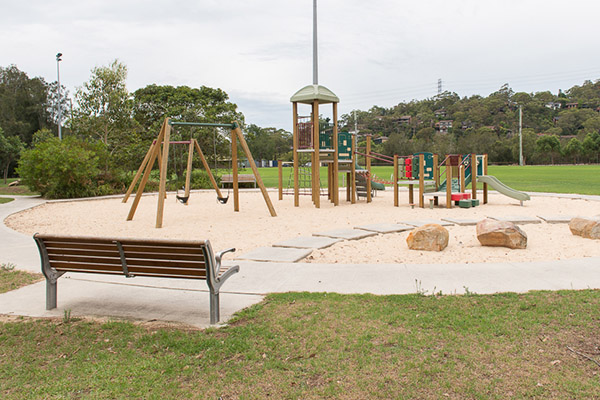 Playground with sand. swings, climbing fort and slides