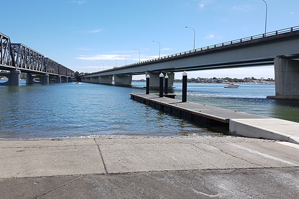 Boat ramp with bridge view