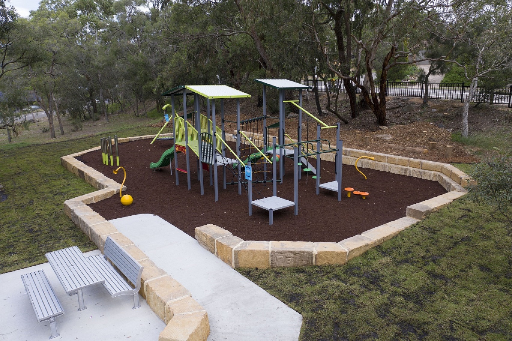 Aerial photo of playground and picnic seating