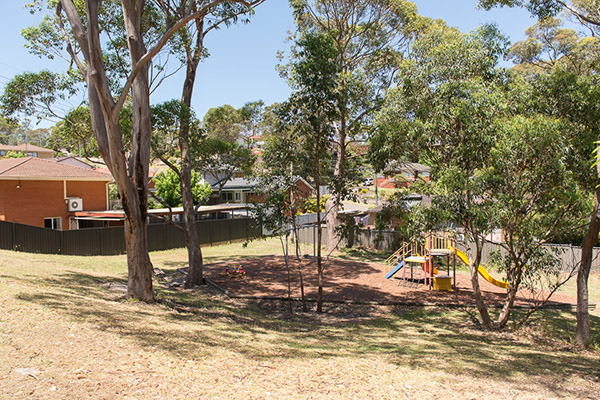 Park with native trees and playground