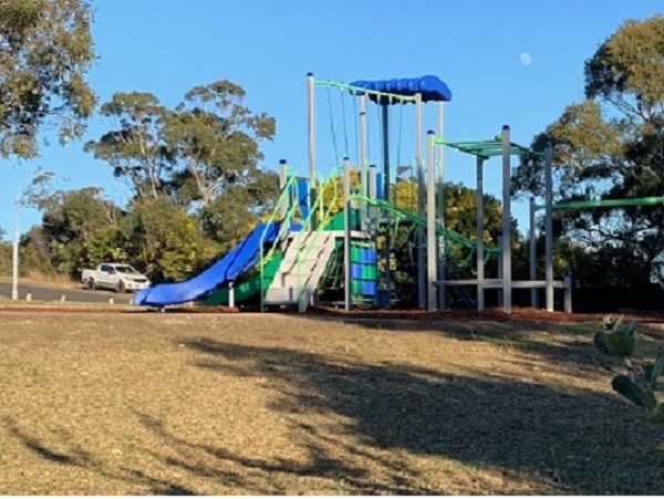 Play equipment with slide and monkey bars