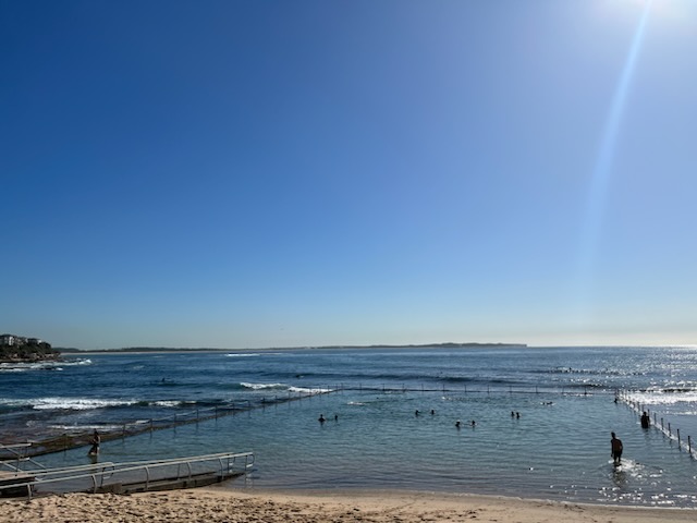 Sparkling ocean pool with sandy beach