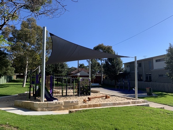 Park with playground and exercise equipment