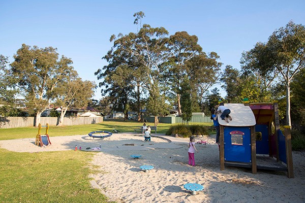 Playground with sand softfall, toddler slide and play hut