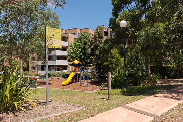 Playground with slide, swings and climbing equipment