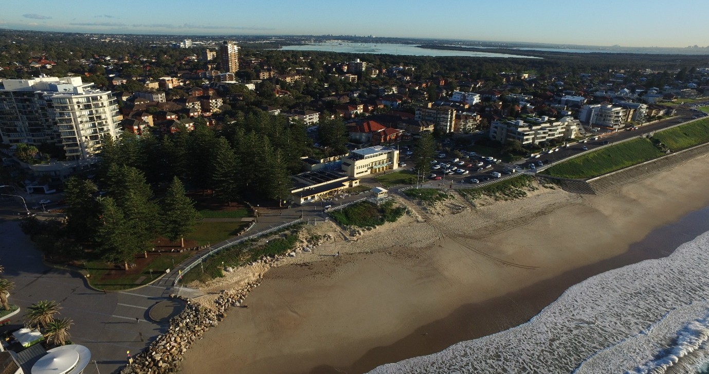 Aerial view of NCSLSC Aerial view of foreshore buildings with beach near Peryman Square and skyline