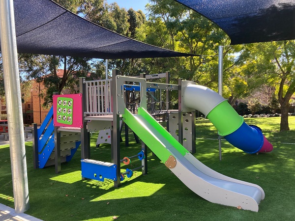 Playground slide with shade sail