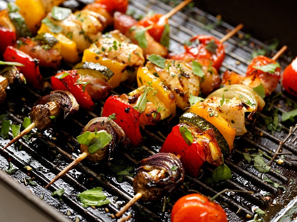 Vegetable skewers on a grill