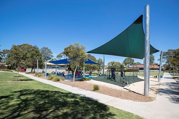 Playground with sand and shade sail