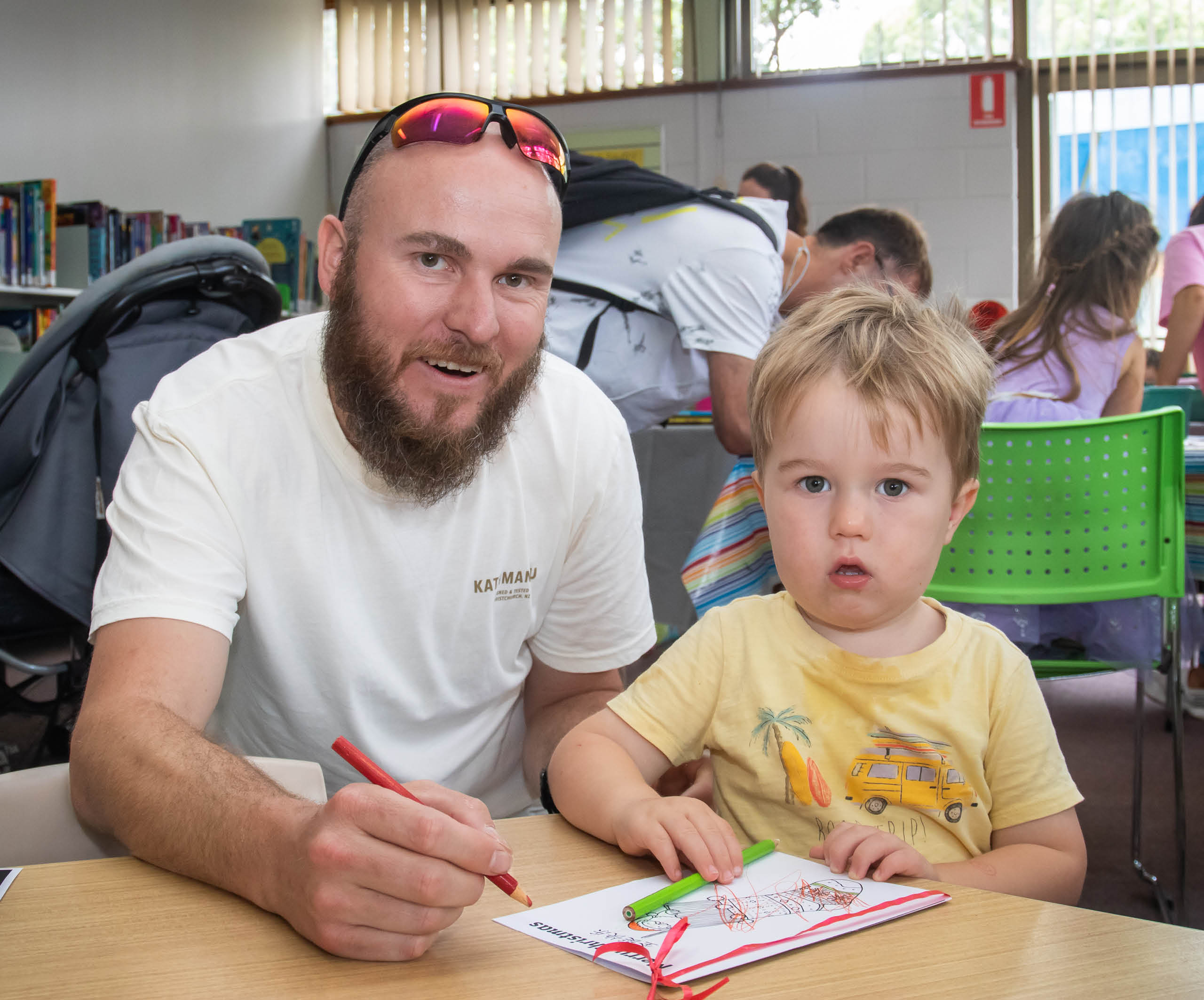dad colouring in with toddler boy at miranda library